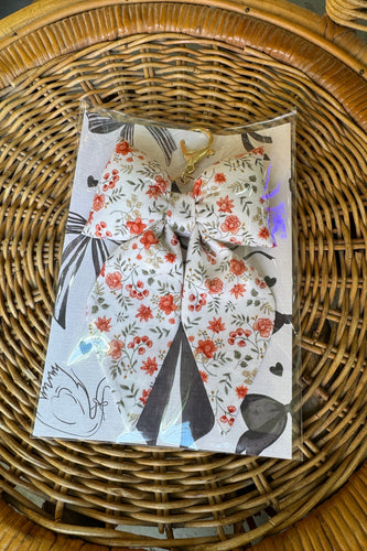 Floral-patterned product packaging on a woven surface