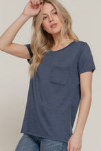 Load image into Gallery viewer, Woman wearing a blue t-shirt with a pocket on a plain background