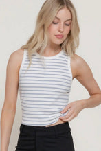 Load image into Gallery viewer, Woman wearing a striped tank top and black pants against a plain background