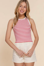 Load image into Gallery viewer, Woman wearing a red and white striped tank top and white shorts on a beige background