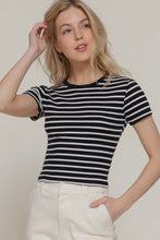 Load image into Gallery viewer, Woman wearing a black and white striped shirt against a plain background