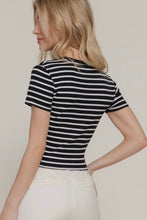 Load image into Gallery viewer, Woman wearing a black and white striped shirt against a plain background