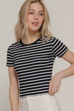Load image into Gallery viewer, Woman wearing a black and white striped shirt against a plain background